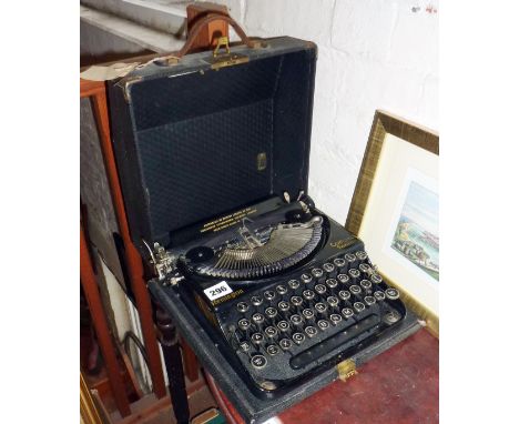 Remington compact portable typewriter "assembled by British Labour at the Remington Typewriter Factory, London from parts mad