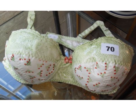 Painted pottery soap dish in the form of a brassiere by Ian & Lyn Wright of Cors Its Ceramic, Ireland