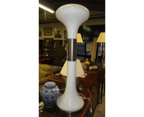 A tall Italian white glass lamp with a shaped glass base and shade, with polished steel fittings