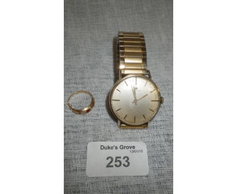 An 18ct yellow gold ruby and diamond dress ring and a gentleman's yellow metal cased Certina wristwatch (2)