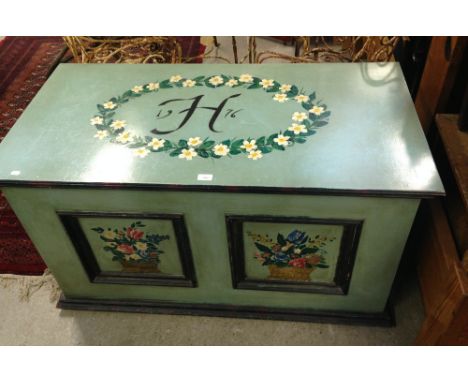 A green and floral painted trunk