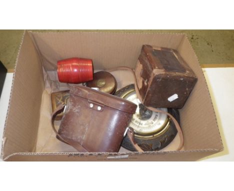 An oak mounted barometer and other similar items  