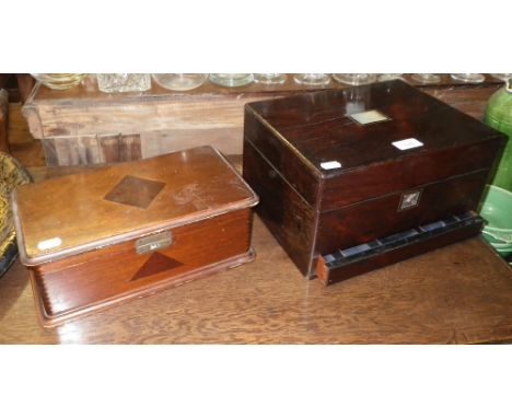 A Victorian rosewood and mother-of-pearl inlaid travelling case with label: 'Simonton, The Royal Panopticon of Science & Art,