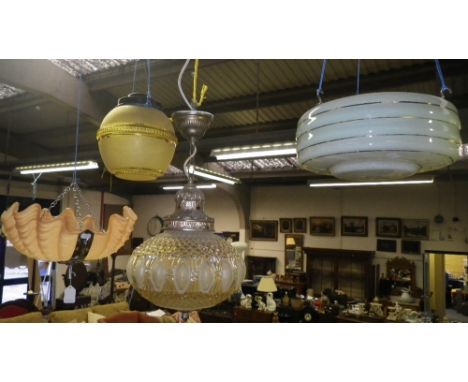 A collection of hanging glass light fittings and  broad dished glass shades