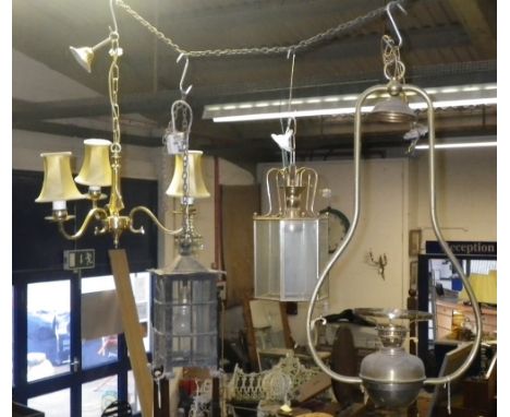 A collection of hanging hall lanterns and other light fittings