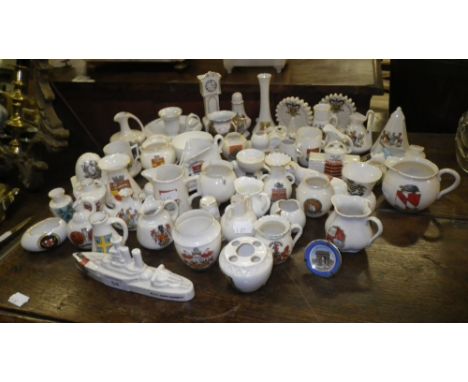 A collection of crested ware, to include a model of RMS Queen Elizabeth