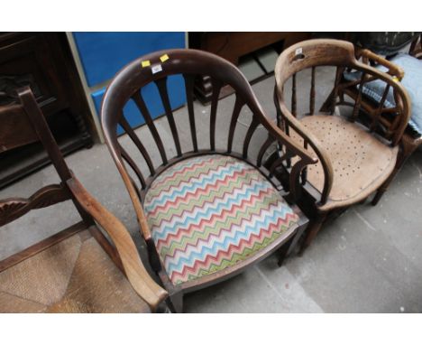 An Edwardian inlaid mahogany tub shaped armchair, with slat back, the seat upholstered in coloured tapestry.