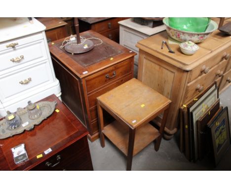 A yew wood finish two drawer filing chest, the top inset with brown leather, 77.5 cm x 54 cm wide x 68 cm deep, and a light o