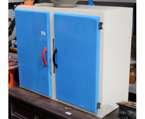 A mid century white and blue painted wall cupboard with blue gate hinges, 60 cm high, 76 cm wide, 30 cm deep