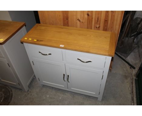 A small modern light oak topped and grey painted sideboard, 80 cm x 90 cm x 35 cm.