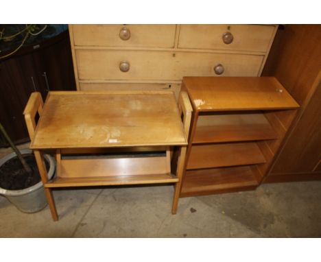 A mid century beech two tier magazine rack, 77 cm wide and a light oak veneered open front bookcase.