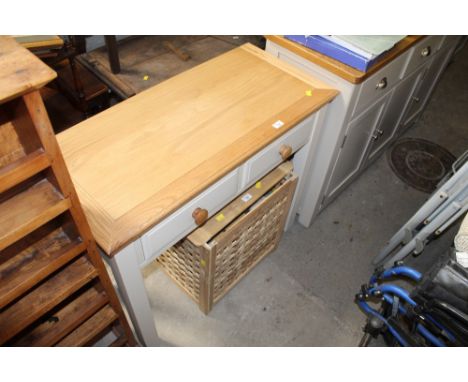 A modern light oak topped and grey painted side table with two drawers, 77 cm x 90 cm x 41 cm.