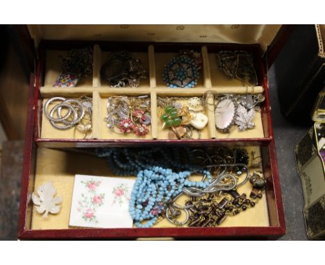 A red faux leather jewellery box containing a quantity of mixed jewellery including micro mosaic brooch, Women's League of He