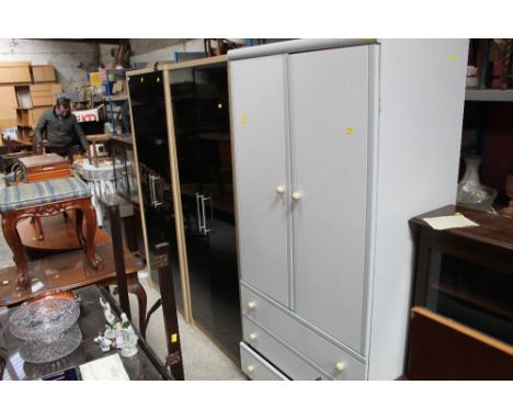 A pair of light oak and black laminate double wardrobes, each 180 cm high, 66 cm wide, 46 cm deep, one other laminate wardrob