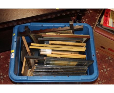 A box of mixed pictures and frames including an embroidered tapestry worded "What is the home without a mother" in carved Oxf