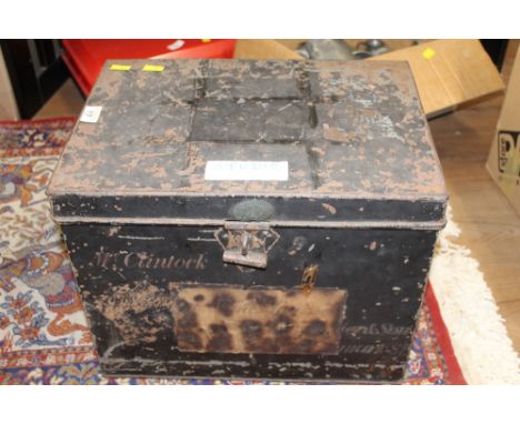 An early 20th century tin trunk, small proportions.