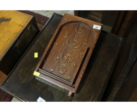 A modern hardwood bagatelle board, 34 cm long
