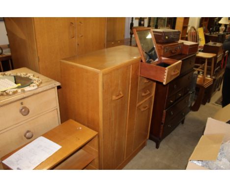 A G Plan light oak compactum wardrobe, the upper drawer fitted with sliding vanity mirror.