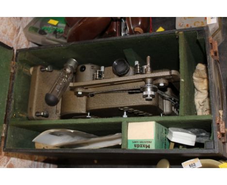 A Specto "500" projector, cased.