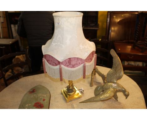 A modern brass electric table lamp with tasseled shade, 78 cm high  