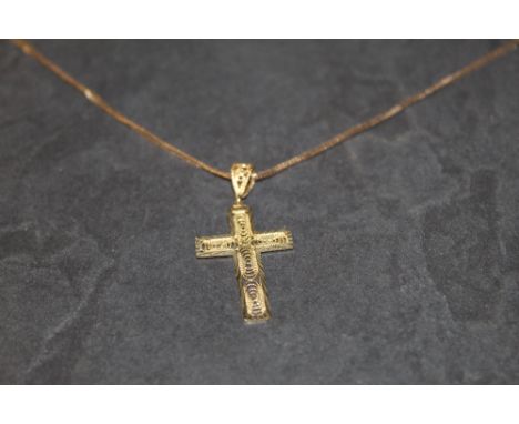 A 9ct gold filigree crucifix pendant and fine chain, total weight 3.9 grams  