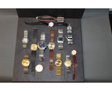 Thirteen vintage and modern wristwatches, including Timex.
