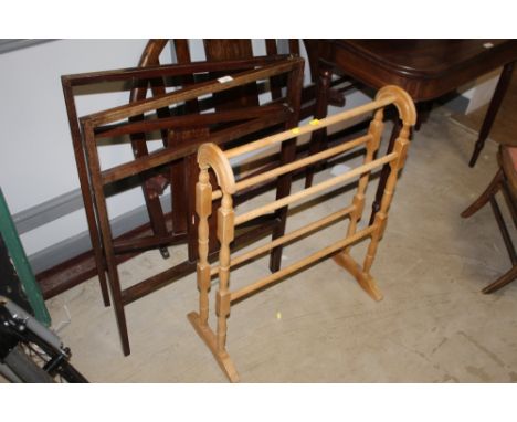 An Edwardian inlaid mahogany towel rail and a modern light wood towel rail