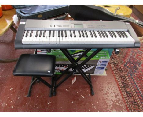 Casio electric organ with stool