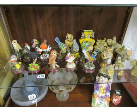 Shelf of animal & bird figures