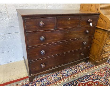 A 19thc Scottish mahogany chest of drawers with three short drawers above three graduated drawers on bracket supports, (100cm