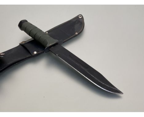 USA Vietnam period jungle knife, plastic green handle, blacked blade, black leather scabbard