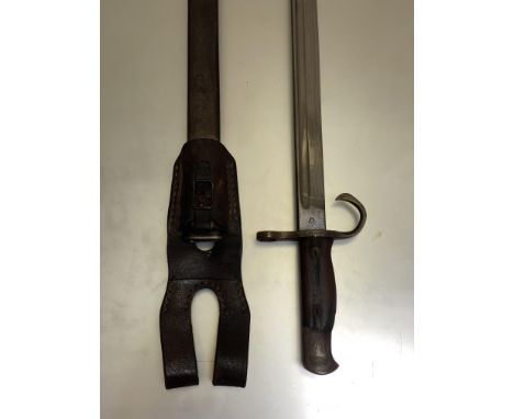 A Japanese model 1897 bayonet, steel scabbard and leather frog