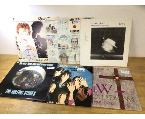 A collection of six records including David Bowie, John Lennon, Robert Plant, Rolling Stones (2), and Simple Minds (6)