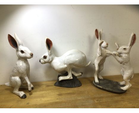 A collection of ceramic hares, one with initials BA to base (?), (tallest 36cm h)