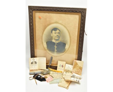 A BOX CONTAINING ARCHIVE TO A MERCHANT SEAMAN, serving during WW2, to include photos, ID Cards, Port Cards, Clothing book, wa