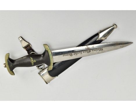 A GERMAN 3RD REICH SS DAGGER, the Dagger is complete with scabbard and belt hanger which is marked 'A' Assmann? DRGM RZM M5/8
