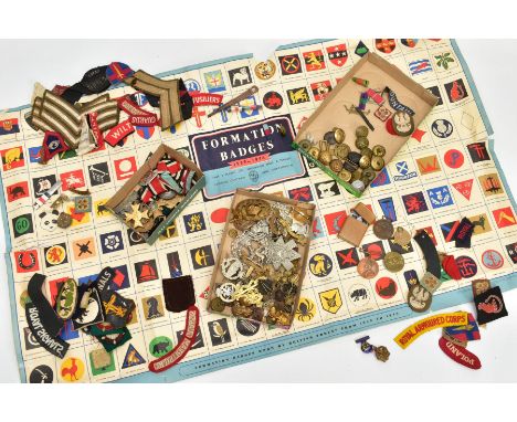 A LARGE BOX CONTAINING LARGE QUANTITY OF MILITARY BADGES, MEDALS, BUTTONS, CLOTH FORMATION BADGES, REGIMENTAL TITLES, etc, to