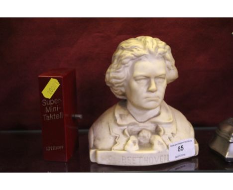 A bust of Beethoven; and a Super Mini Taktell metronome 