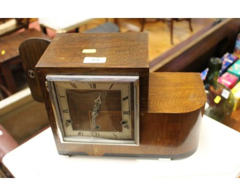 An Art Deco three hole mantel clock 