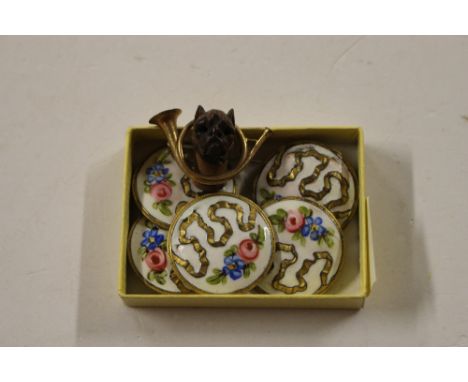 A set of five enamel decorated buttons; and a yellow metal dogs head brooch 