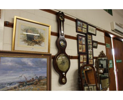 A 19th Century mahogany and inlaid banjo barometer 