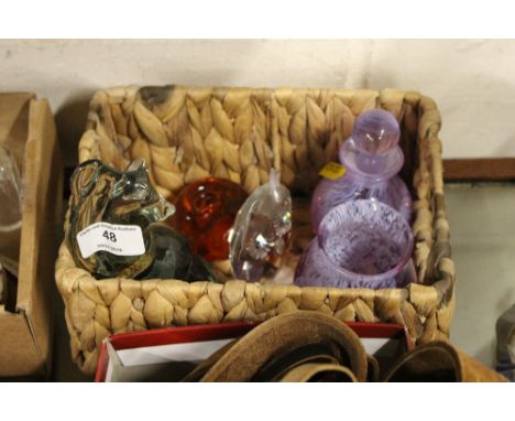 A basket containing a Caithness scent bottle and similar vase; two glass paperweights and a glass owl ornament 