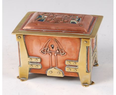 An Art Nouveau copper and brass casket, possibly Glasgow School, with all over raised and relief floral stylised decoration, 