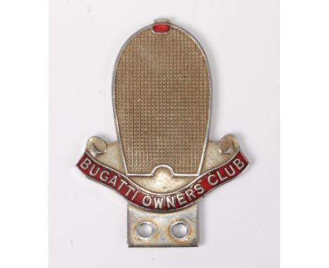 Bugatti - A relief cast chrome Owners Club badge, with red enamel detail and twin lower fixing holes, circa 1960s, 9.2 x 7cm