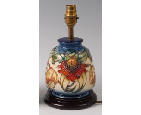 A modern Moorcroft pottery lamp in the Anna Lily pattern, of mallet form, underglaze painted and tube-line decorated, raised 