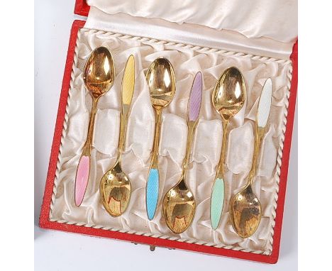 A cased set of six 1960s Frigast Danish silver gilt and guilloche enamel decorated teaspoons, each teaspoon with different co