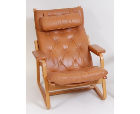 Ole Wanscher (1903-1985) for CADO - A 1960s light oak framed and tan leather button upholstered open armchair, the frame of c