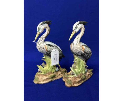 TWO CERAMIC FIGURES OF 'GREAT BLUE HERON'along with a collection of decorative plates