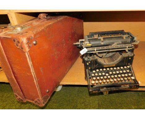 An Underwood Standard number 5 typewriter, and a mid century leather case. 