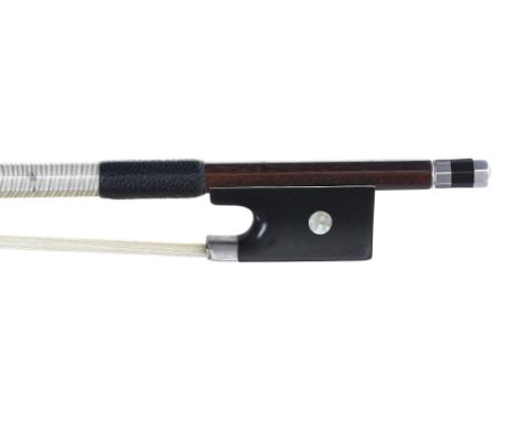 Nickel mounted violin bow circa 1900, unstamped, the stick round, the ebony frog inlaid with pearl eyes and the ebony adjuste